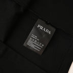 PRADA T-shirt with small figure graphic at the neckline