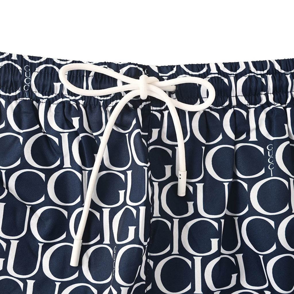 Gucci All-Over Logo Print Swim Shorts – Navy