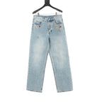 Louis Vuitton Light-Wash Denim Jeans with Playful Embroidery