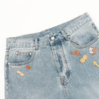 Louis Vuitton Light-Wash Denim Jeans with Playful Embroidery