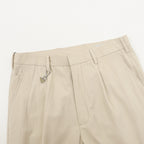 Prada Trousers with Triangle Logo Keychain