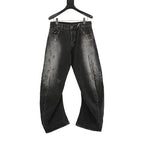 Acne Studios Distressed Denim Trousers with Paint Splatter Effect