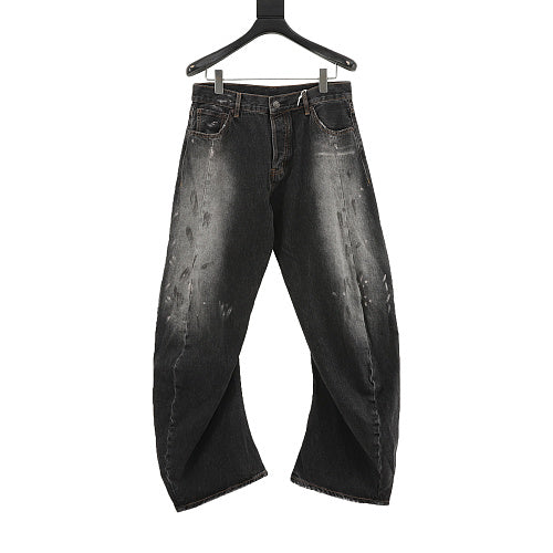 Acne Studios Distressed Denim Trousers with Paint Splatter Effect