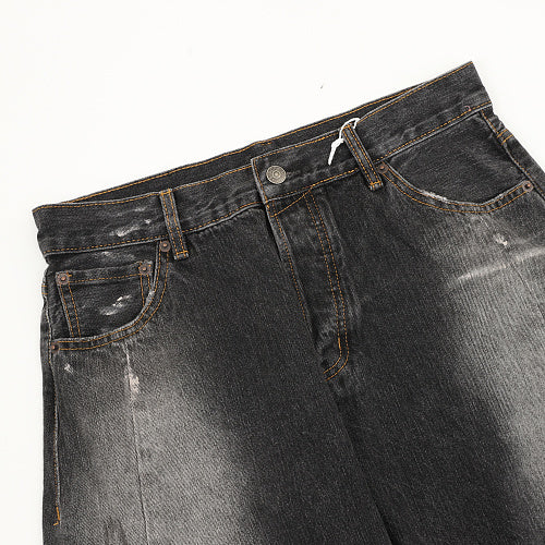 Acne Studios Distressed Denim Trousers with Paint Splatter Effect