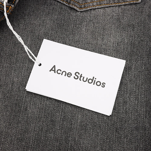 Acne Studios Distressed Denim Trousers with Paint Splatter Effect