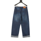 Louis Vuitton Distressed Patchwork Denim Trousers