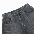 Balenciaga Distressed Loose-Fit Jeans with Leg Patch Detail